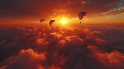 Keuken spatwand met foto Skydivers are flies on background of sunset sky. © bird_saranyoo