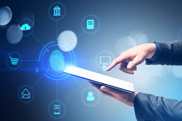 Close up of male hand using smartphone with thumb print, creative round digital interface with various icons. Digital transformation, online banking, shopping and storage concept.