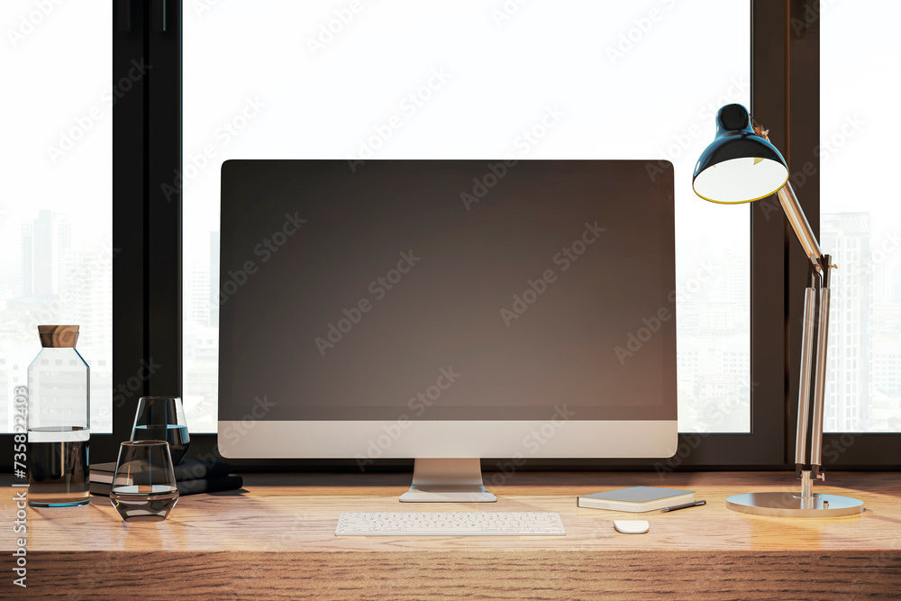 Poster Bright designer desktop with empty computer monitor, lamp, supplies and other items. Window with city view in the background. Mock up, 3D Rendering.
