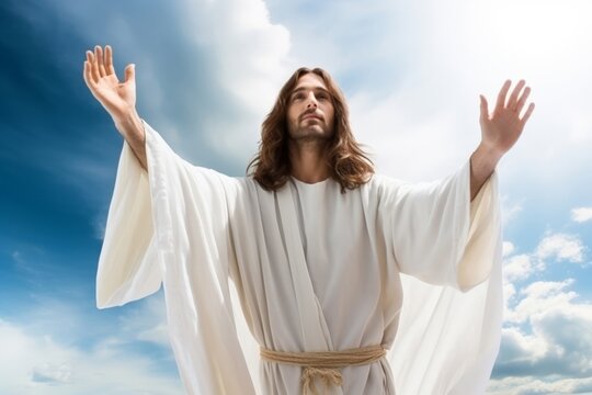 Jesus Christ in white clothes extends his hand to you against the sky as a symbol of Christianity