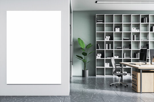 Modern office interior with empty mock up banner on concrete wall. furniture, bookcase and equipment. 3D Rendering.