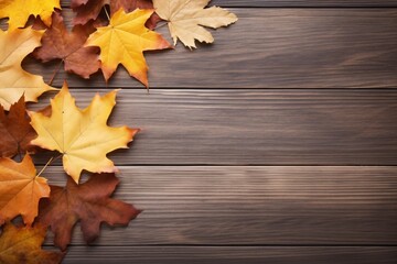 a group of leaves on a wood surface