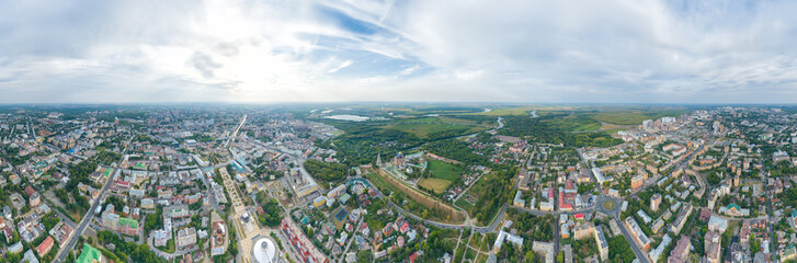 Fototapeta na wymiar Ryazan, Russia. Ryazan Kremlin - The oldest part of the city of Ryazan. Protected meadow. Panoramic view of the city from the air. Panorama 360. Aerial view