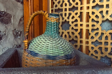 Vintage wine jug in the cellar