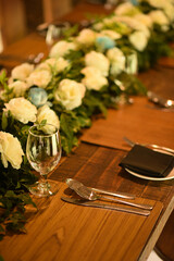 Wooden table cutlery with floral decorations