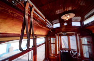 Travel by Portugal. Interior of old retro tram.
