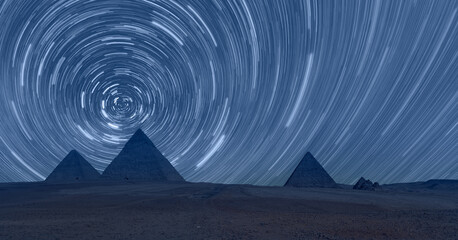 Giza Pyramid Complex with Starry sky at night - Cairo, Egypt 