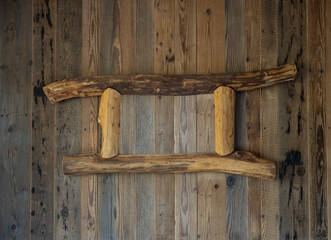 natural wooden frame on wooden wall