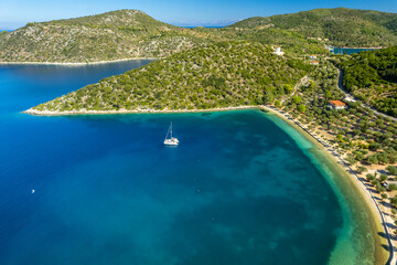 Aerial view of a moored yacht near Dexia beach on Itaca island, Greece