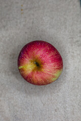 Close-up photo of a fresh and appetizing red apple shot from various angles 
