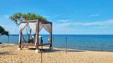 Romantic luxury dinner table setting at tropical beach with  beautiful seascape view