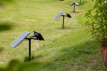 Line of solar panels mounted on metallic poles for alternative source of electrical energy