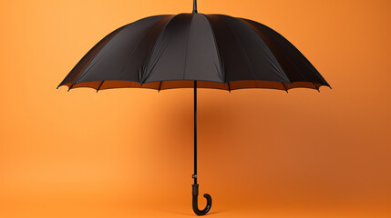 an open umbrella on an orange background