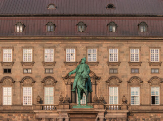 Copenhagen, Denmark. Equestrian Statue of King Frederik VII against the backdrop of the Christiansborg Palace by sculptor Herman Wilhelm Bissen (1798-1868).