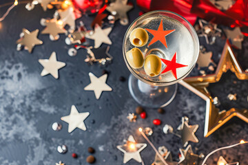 Obraz na płótnie Canvas Themed elements around the delicious Martini, with olives and stars to represent the US flag, June