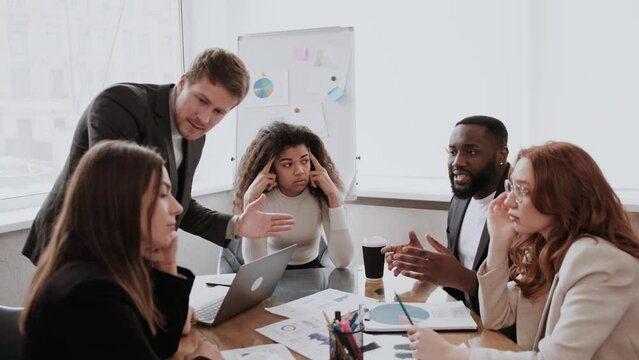 stress at work in the office, problems at work, employees swear at the workplace