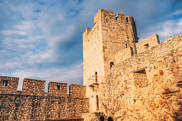 Explore the historic charm of Belgrade's Kalemegdan Fortress, where the iconic gates stands tall amidst the bustling park.
