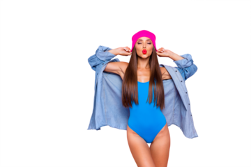 Luxurious girl in a pink hat and blue body sends an air kiss isolated on vivid pink background
