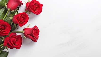 composition of a bouquet of red roses flowers, top view with copy space on a white background