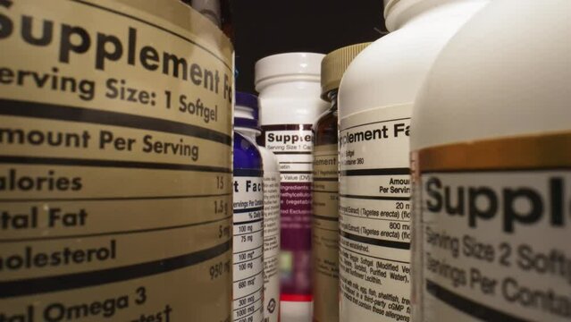 Variety of Jars and Containers for Pills and Dietary Supplements. Plastic Nutritional Supplement Bottles. Immune System Support. Health and Wellness Products