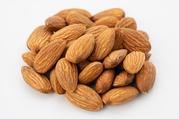 Almond nuts close up. Nut almond close up. Product rich in minerals and vitamins. Almond kernels. Texture of Almond kernels.	
