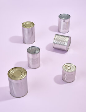 Assortment of cans of canned with different types of fish and seafood. Food donations for needy people.
