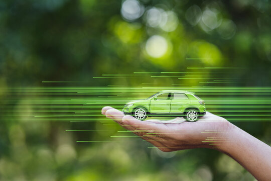 Electric cars, mobile toy cars, electric or hybrid car concepts, green energy Charger station, reducing carbon, saving the world with clean energy. Green business that preserves the environment