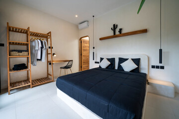 Modern and luxury decorated sleeping room. Black sheets bedroom