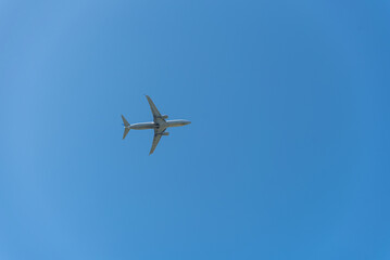 Airplane flying in the blue sky