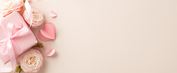 Stunning top view arrangement featuring roses, heart embellishments, and elegantly packaged gift,...