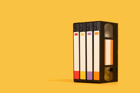 Movie enjoyment and retro composition. Black videotapes and copy space for text.