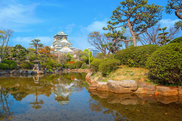 Osaka Castle in Osaka, Japan is one of Osaka's most popular hanami spots during the cherry blossom season - 735962049