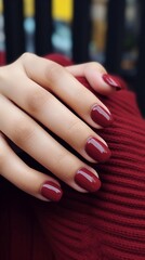 Beautiful glossy red, burgundy manicure, vertical photo, horizontal photo