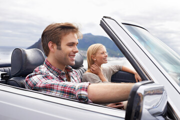 Couple, convertible and driving on mountain road in nature for bonding adventure for holiday,...