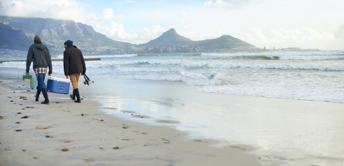 Fishermen, equipment or walking on beach for fishing on cloudy morning or afternoon in Cape Town....