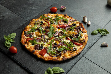 pizza menu on dark plate with stone texture