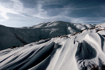 snow covered mountains in winter
