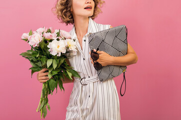 attractive stylish woman holding flower bouquet