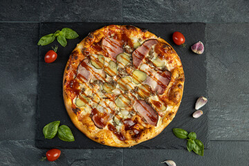 pizza menu on dark plate with stone texture