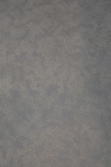 The mottled gray and white fabric surface is suitable for making a background.