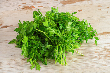 Culinary Detail: Light Wood Setting with Fresh Parsley Bunches