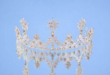The tiara and the luxe feminine look. Decorative jewelry and diamonds.