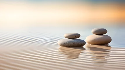 Outdoor kussens Zen stones with lines on the sand. Spa therapie and meditation concept © Ziyan