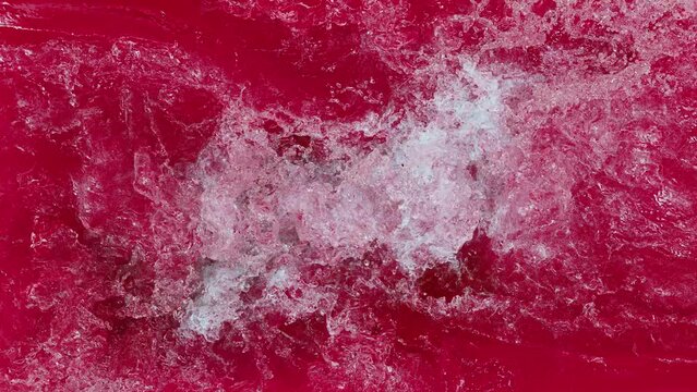 choppy red water. swirl in red water. 3d animation of turbulent red water. 3d animation of red water with copy space