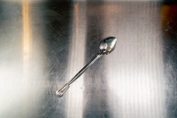 top view In the restaurant kitchen there are kitchen utensils such as a spoon on the table