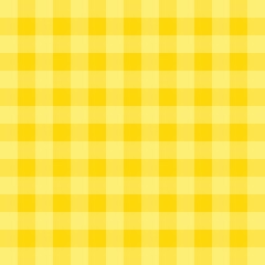 Yellow gingham tablecloth plaid pattern background.