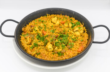 A typical Valencian seafood paella with rice
