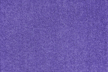 Texture background of purple fabric. Upholstery jacquard texture cloth, boucle furniture textile material, design interior, decor. Ridge fabric texture close up, backdrop, wallpaper.