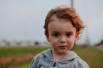 Portrait of a little boy looking at camera