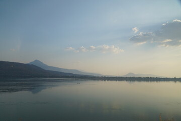 The sunset the reflection of the mountains along the river are absolutely beautiful.